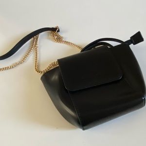 Melie Bianco black cross body purse with gold chain